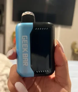 Click to view full screen Blue and black Geek Bar device held in a hand