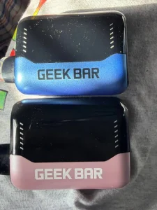 Click to view full screen Blue and pink Geek Bar devices shown side by side